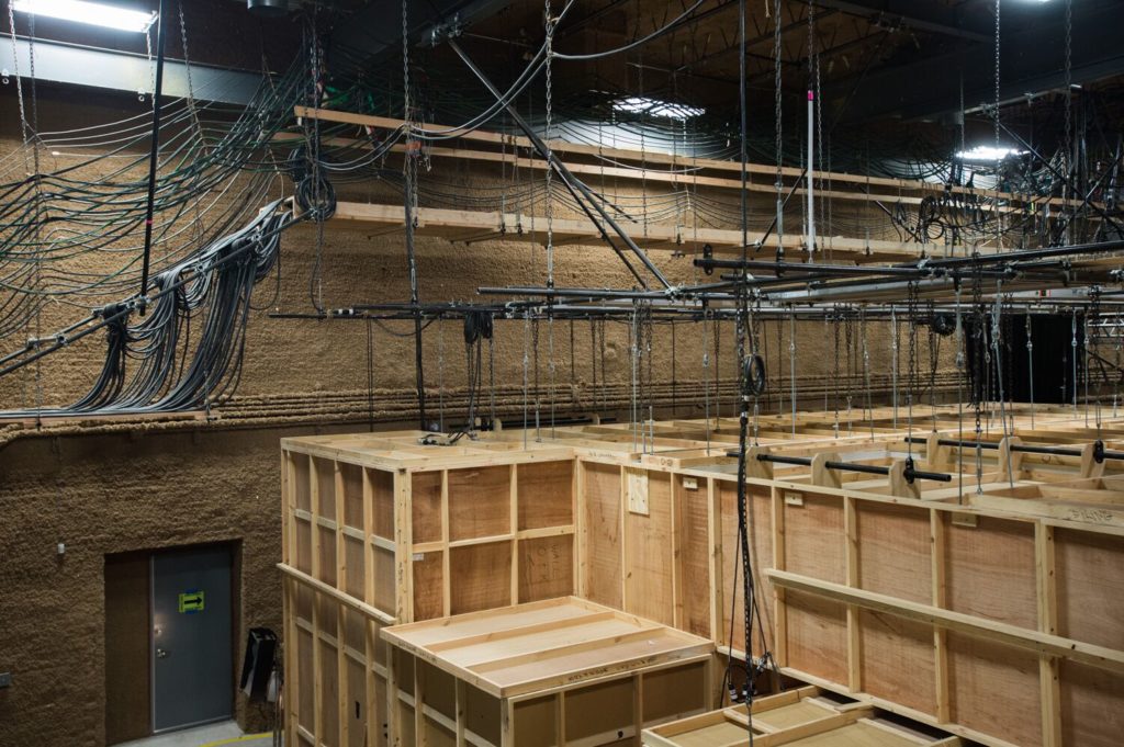North Stage at Annex 302 with wooden set flats erected and cable runs overhead