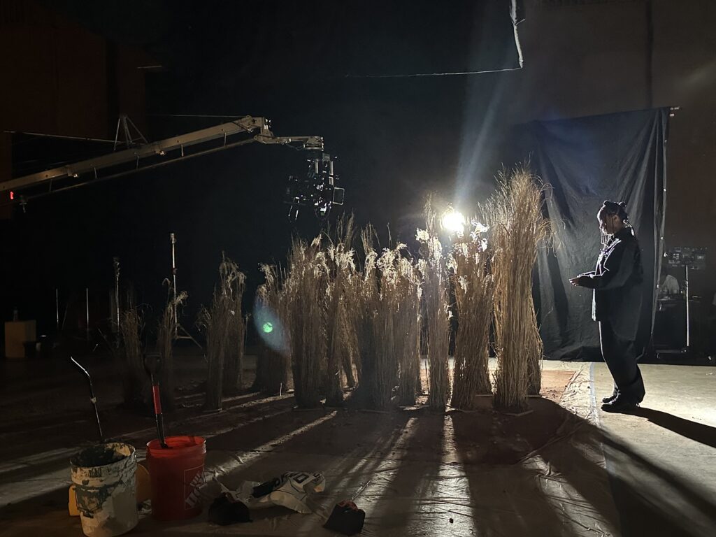 Night shoot on stage at Annex 302 in Brooklyn with a camera crane, actor and backlit haze